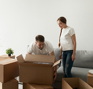 Happy family moving into a new house